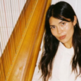 Harpist Leng Bian Plays Inside HMCT’s Color-Selected Poster Show